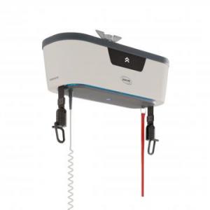 Ceiling-mounted patient hoist unit with two suspension straps and metal hooks hanging below.